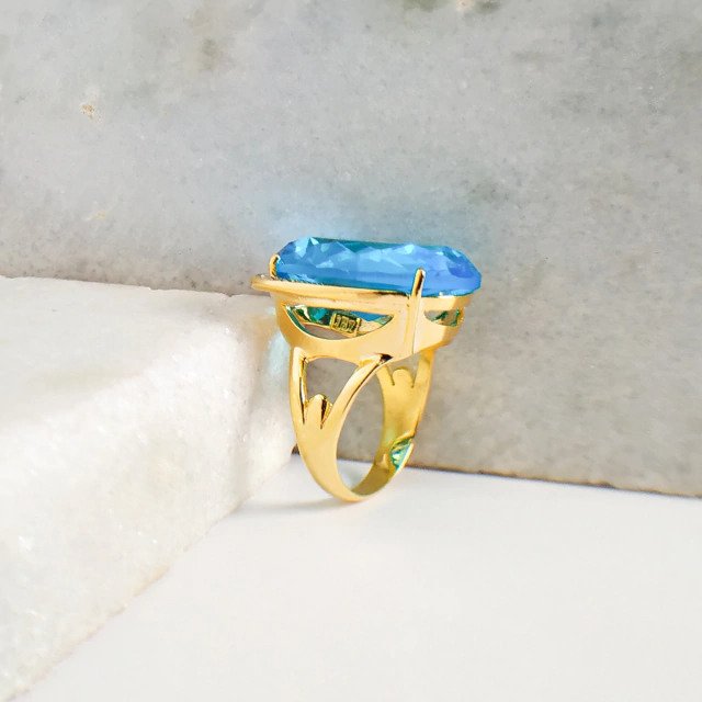 Anel com Cristal Azul Cravejado Banhado a Ouro 18k